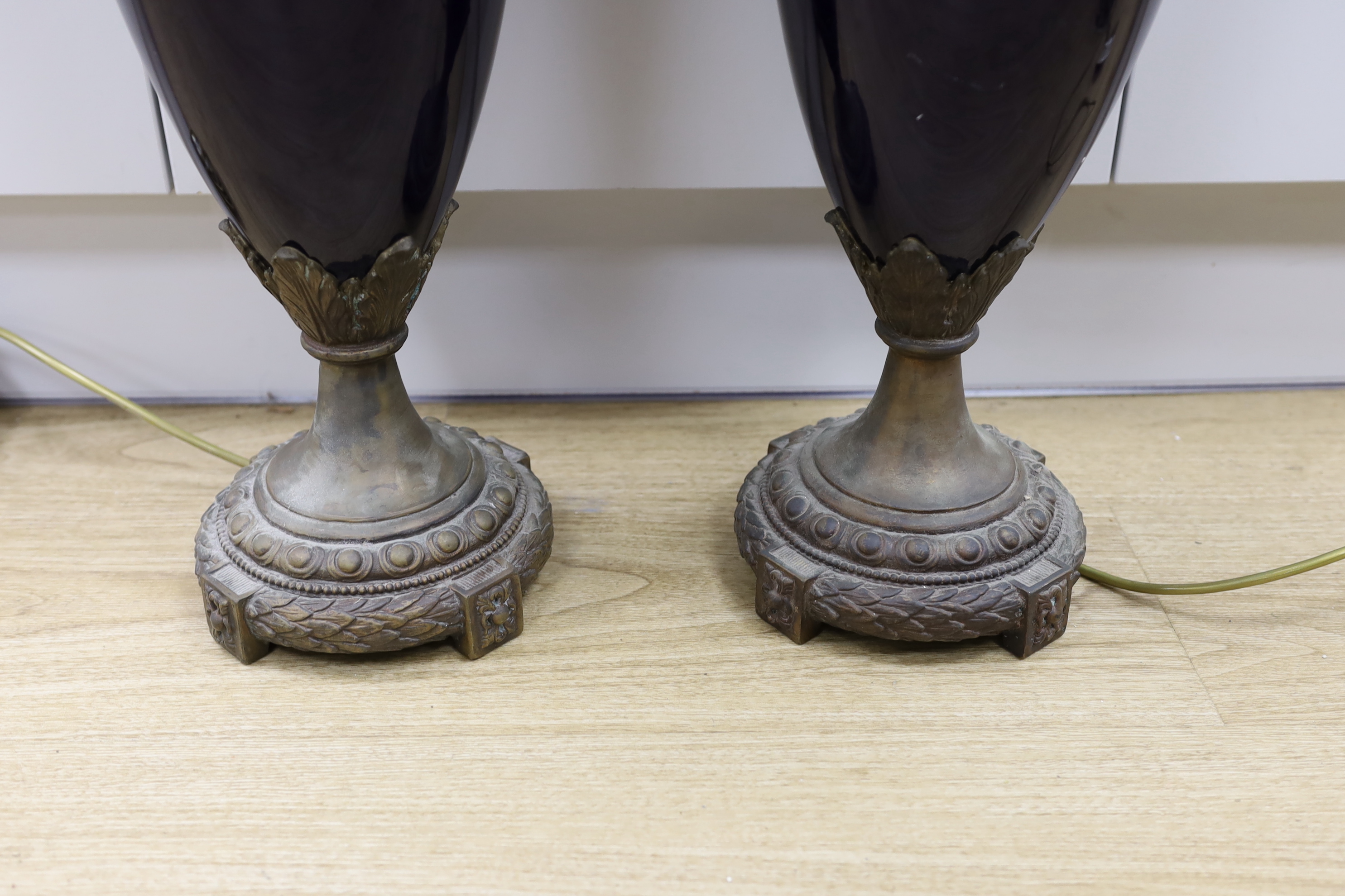 A pair of large Sevres style cobalt blue glazed ceramic lamps with bronzed mounts, 84cm total height